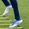 wit-blauwe-adidas-x-voetbalschoenen.jpg