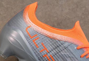 zilver-oranje-puma-ultra-voetbalschoenen.jpg